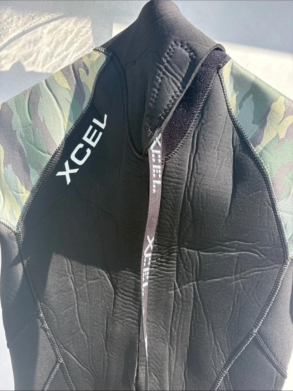 XCEL 3/2mm Boys Black Wetsuit with Camo Sleeves